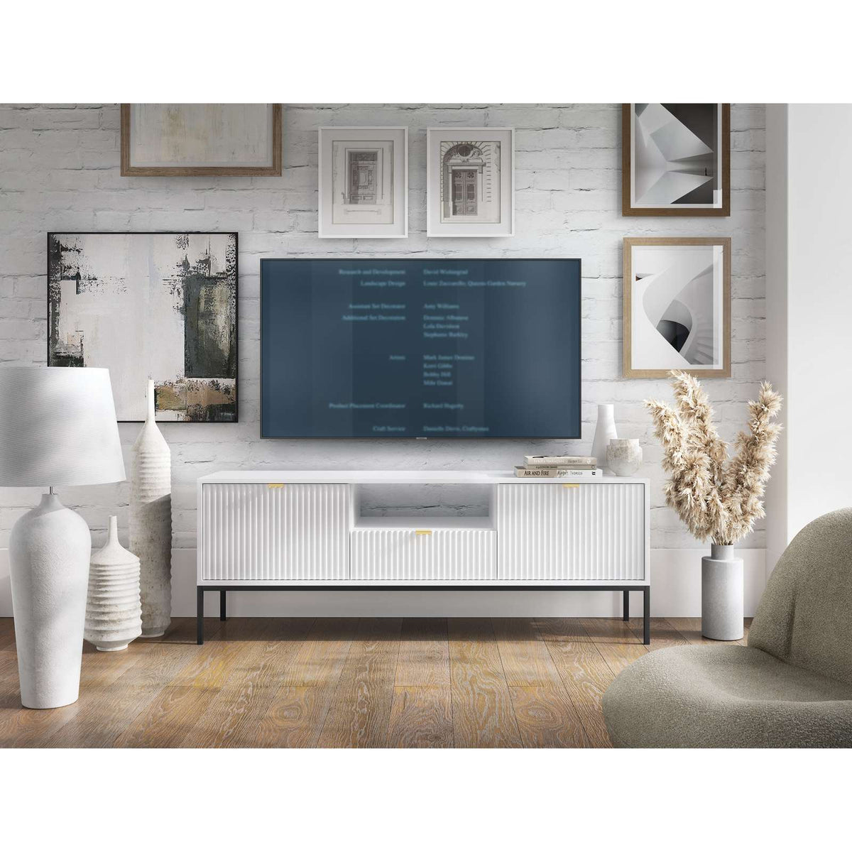 White TV cabinet with ribbed drawer fronts and open center shelf