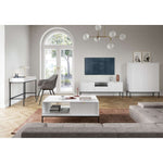 White coffee table with open shelf and ribbed cabinet front