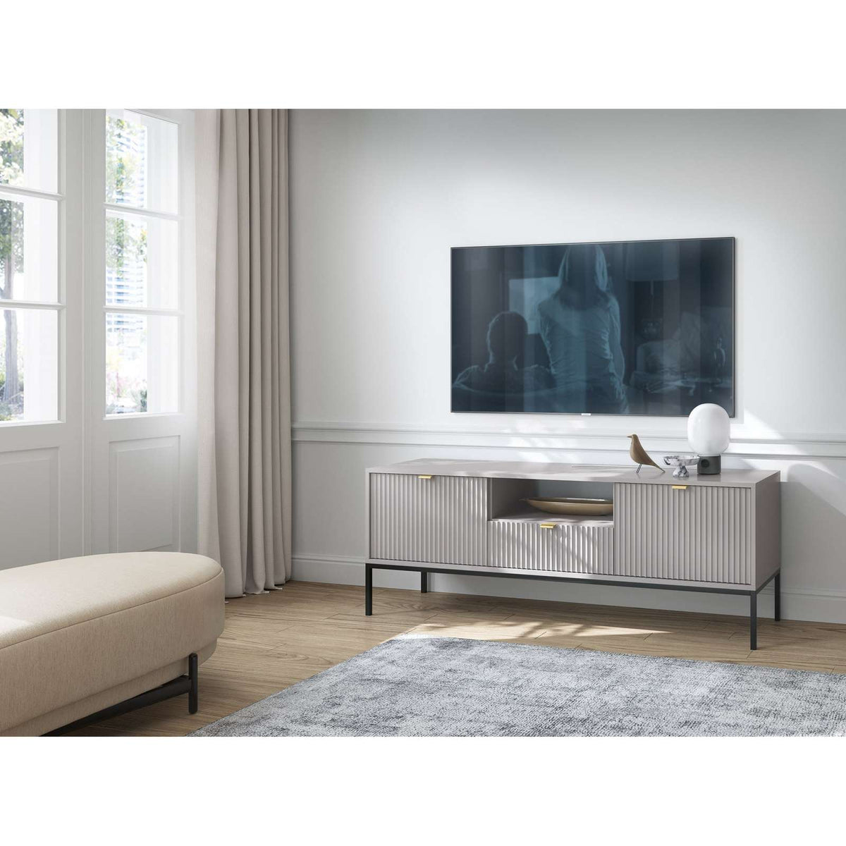 Light grey TV cabinet with ribbed drawer doors and open shelf center