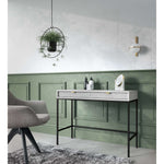 Green console table with light ribbed drawer front, black frame, and open lower shelf