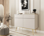 White/cashmere sideboard with 2 drawers and 2 doors, tapered gold legs.