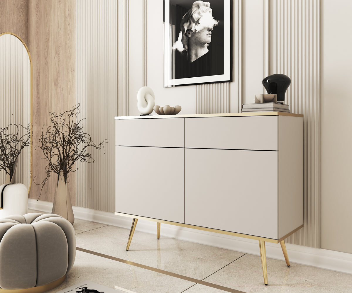 White/cashmere sideboard with 2 drawers and 2 doors, tapered gold legs.