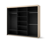 Triple sliding door wardrobe interior with multiple shelves and partitions, black lining