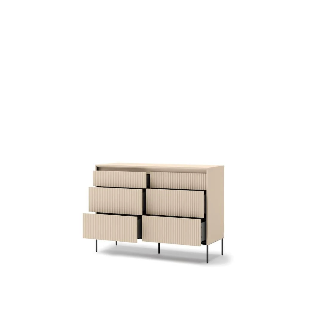 Four-drawer chest of drawers with ribbed fronts and tapered black legs