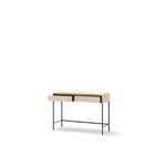 Light wood dressing table with ribbed drawer panel and black metal legs
