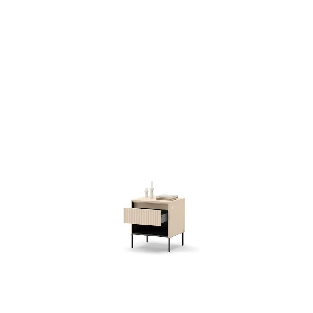 Light beige bedside table with open drawer and ribbed front, black tapered legs