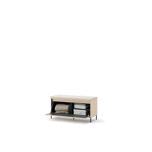 Light beige hallway bench with open storage holding folded blanket and books