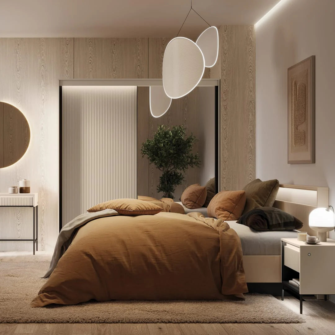 Beige ottoman bed with tall headboard and brown comforter in a modern bedroom