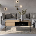 Wood and black-accent coffee table with drawer and open center storage compartment