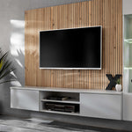 Media wall with wood slat back, gray TV console, and LED-lit glass side cabinet