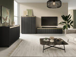 Black bedside cabinet with ribbed door and gold accent strip, coordinating media console nearby.