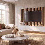 Grey media wall unit with slat panel, TV, and glass cabinet doors and shelves