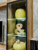 Ray TV wall unit glass door display with LED glow and yellow decorative items inside