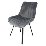 Grey velvet upholstered chair with stitched seat channels, curved back, and black legs