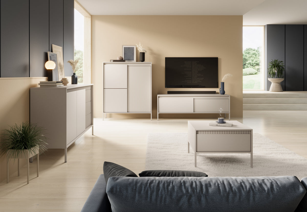 Beige sideboard cabinet with two doors and three drawers, ribbed fronts and slim legs.