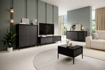 Sals long TV cabinet, dark black with ribbed doors and metal legs in room scene