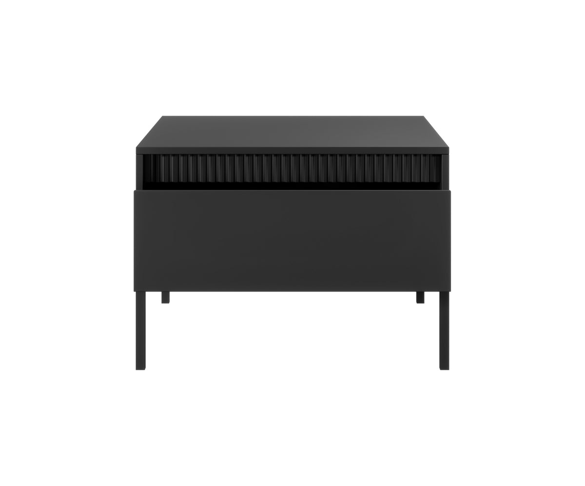 Black rectangular coffee table with ribbed top panel and single drawer front