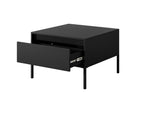 Black rectangular coffee table with ribbed top panel and open drawer compartment