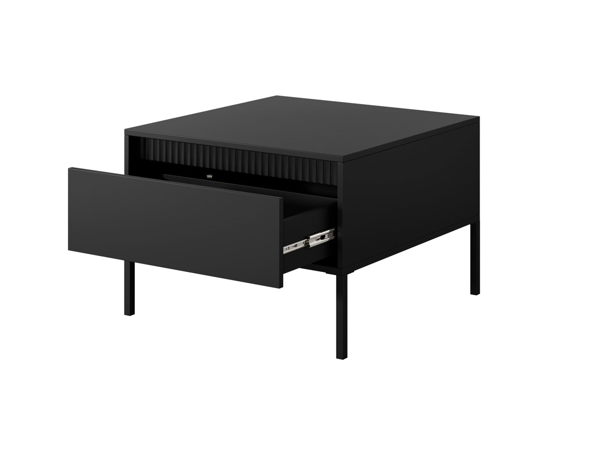 Black rectangular coffee table with ribbed top panel and open drawer compartment