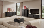 Beige TV cabinet with open shelves and sliding fronts, ribbed detailing and slim legs.