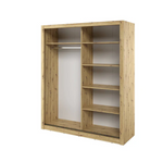 Light wood wardrobe interior with shelves, compartments, and a hanging area.