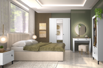 White bedside table with single door and gold-tone handle