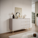 Beige ribbed sideboard with two drawers and cabinet doors, gold-tone handles, tapered legs