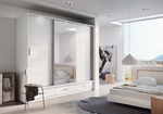 Sliding wardrobe with dark gray doors and shelving visible through open center.