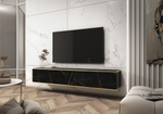 Black marble TV cabinet with gold trim under wall-mounted flat-screen TV