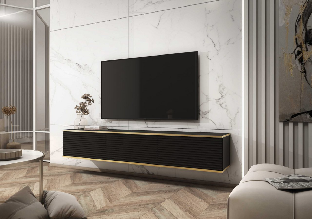 Black TV cabinet with horizontal ribbed panels, two sliding doors, gold-trimmed base.