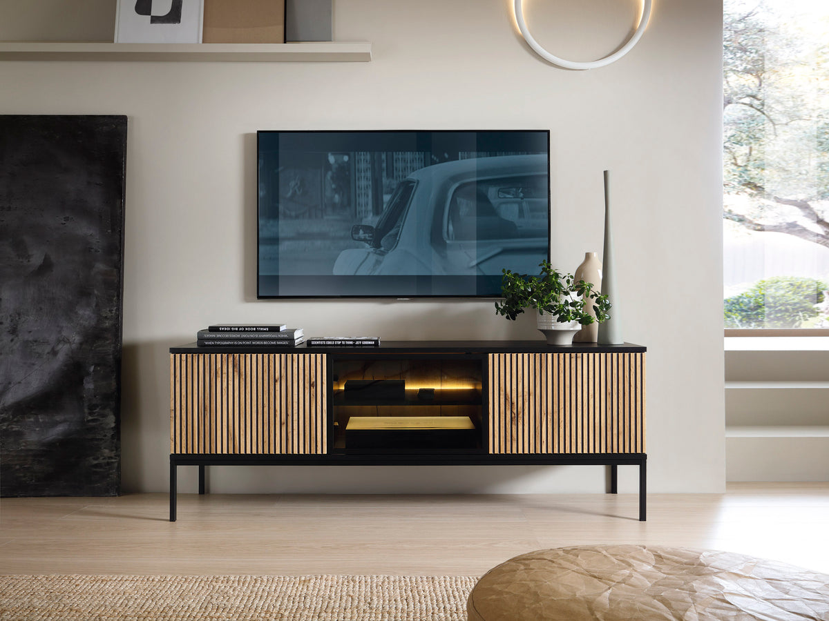 Tina TV cabinet with black frame, vertical oak slat doors and central lit shelf