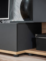 Gray media cabinet base with hinged drawer, wooden legs, and visible hardware