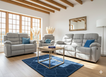 Gray fabric manual recliner set with blue accent cushions, two-seat and three-seat.