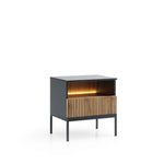 Gray bedside table with vertical slat drawer front and illuminated open shelf