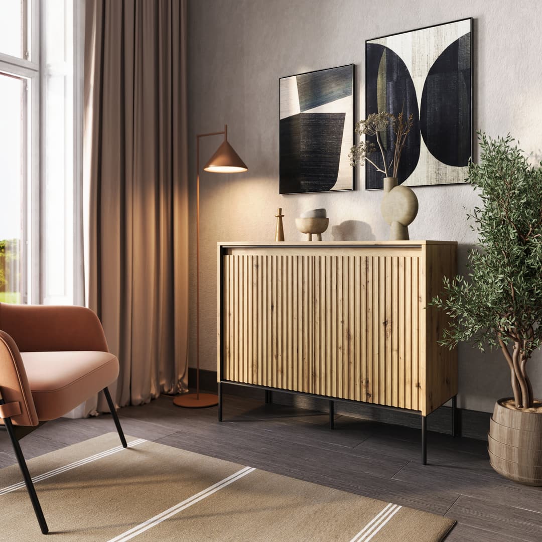 Two-door sideboard with vertical slatted fronts, white top, black legs, light wood body.