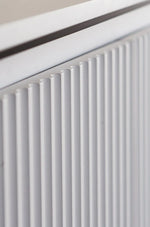 White fluted cabinet door panel detail for a 4-door sideboard.