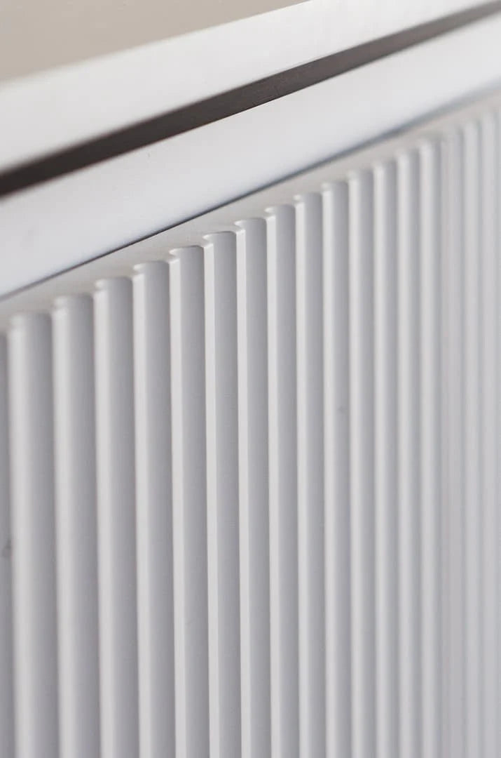 White fluted cabinet door panel detail for a 4-door sideboard.