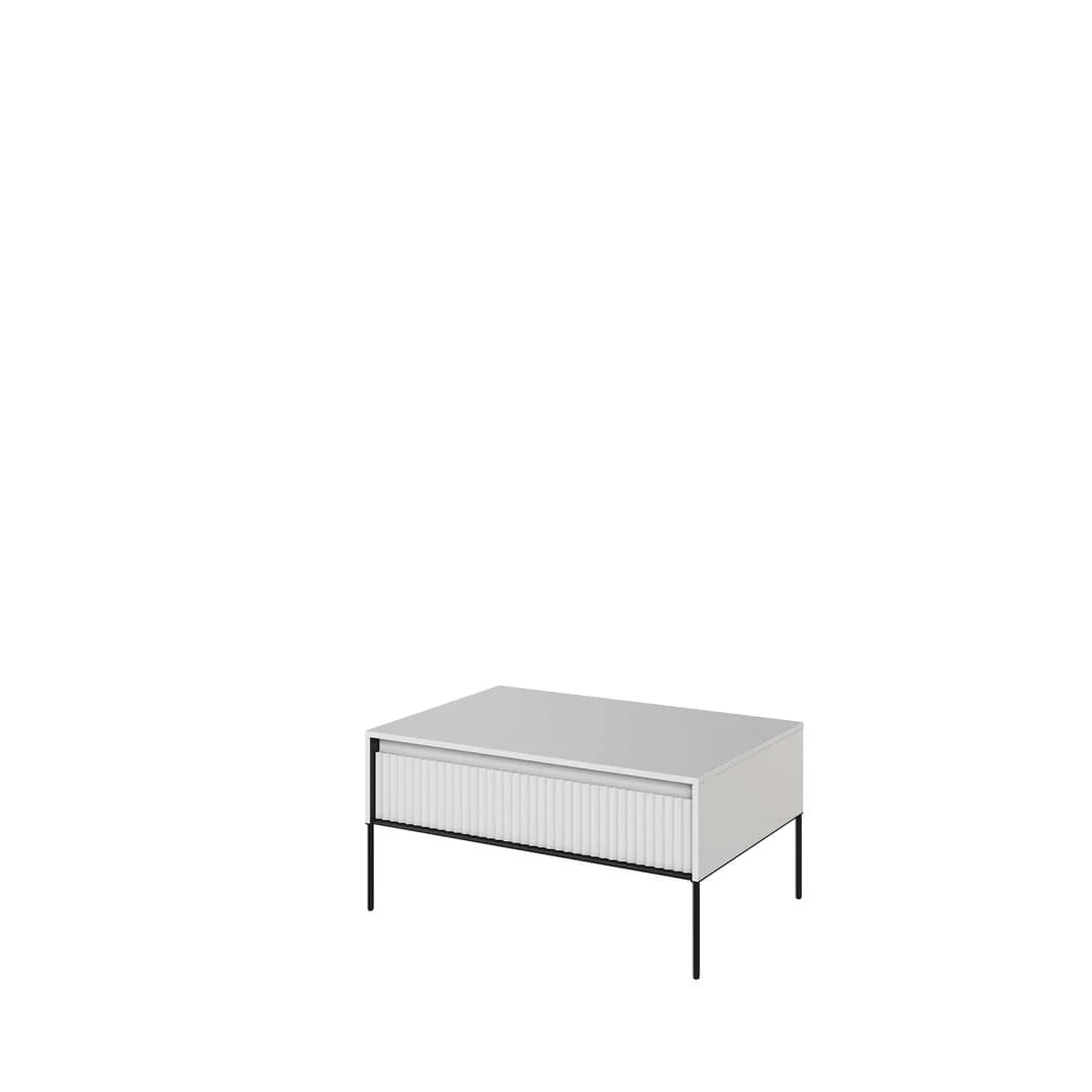 White matt coffee table with ribbed front panel, top surface, and slim metal legs.