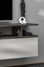 Media wall unit wall shelf with vertical divider and decorative Q item on top