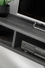 Media wall unit shelf with audio components in a dark wood frame and cable storage