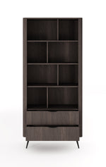 Tall dark wood bookcase with open grid shelves and a center bottom drawer
