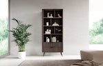 Dark wood bookcase with open shelves and a lower drawer