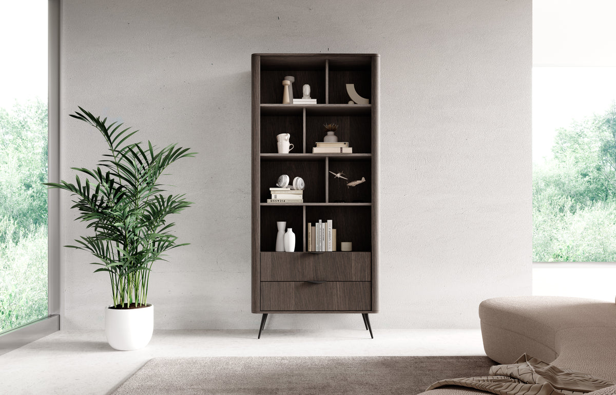 Dark wood bookcase with open shelves and a lower drawer