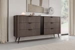 Dark wooden chest of drawers with six drawers, wide top, and central vertical panel