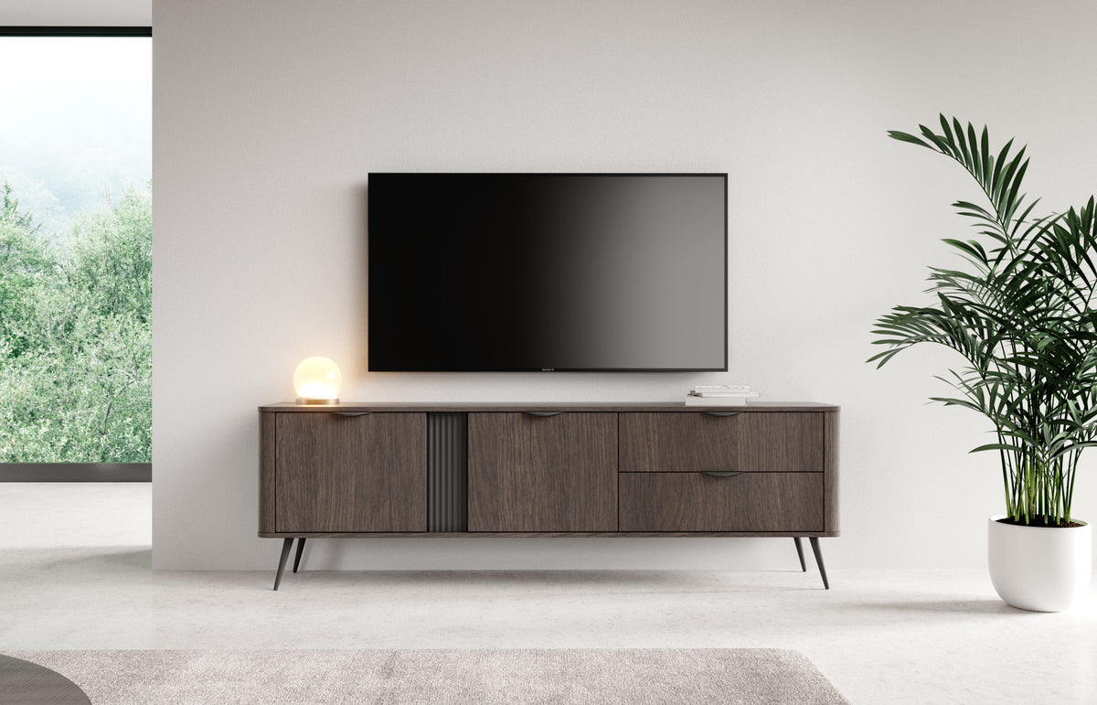 Dark wood TV console with three compartments, drawers, and slim tapered legs