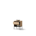 Small cabinet with drawer and open shelf, light wood finish, black metal legs; bowl on top