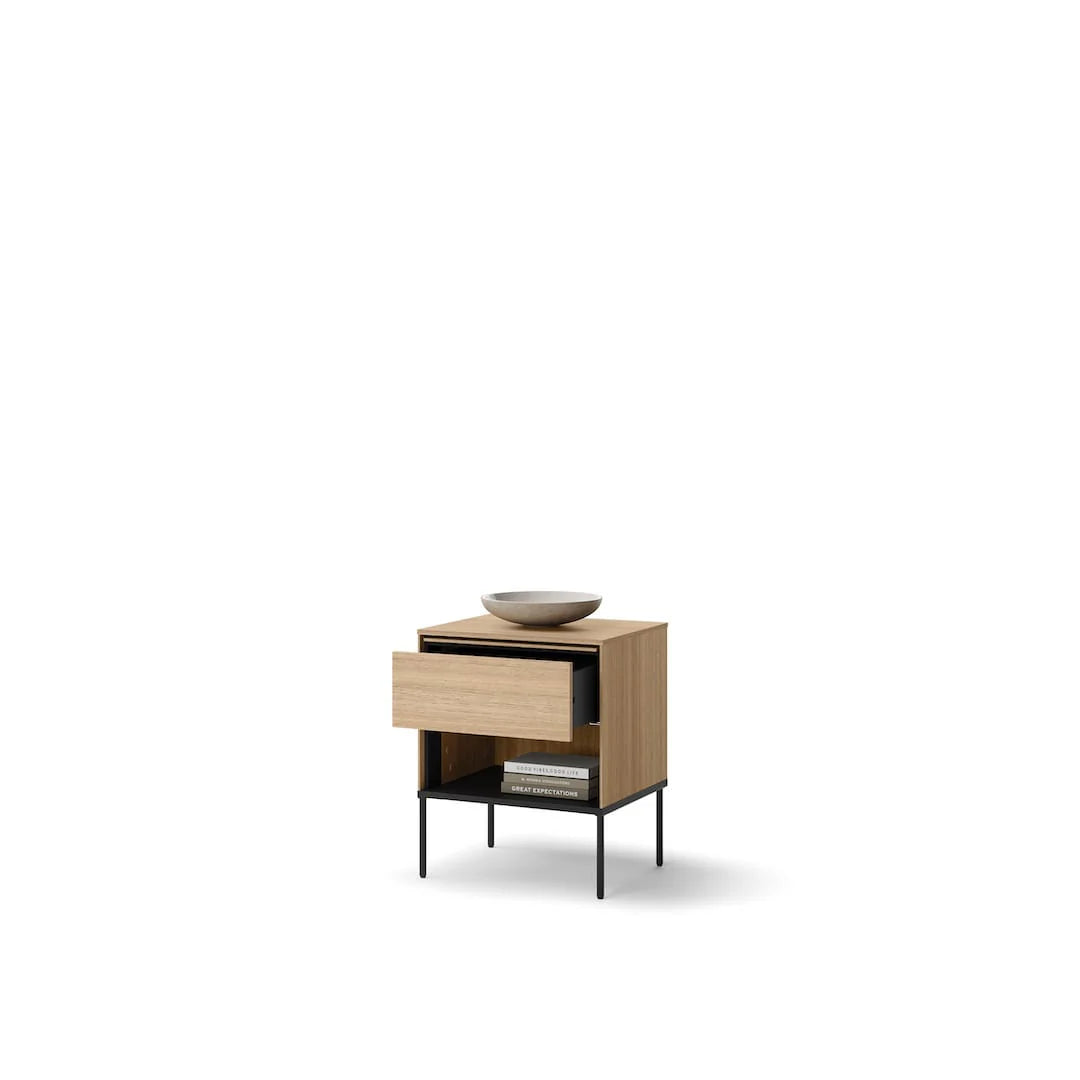 Small cabinet with drawer and open shelf, light wood finish, black metal legs; bowl on top