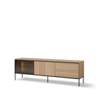 Light wood TV cabinet with dark glass door, two drawers, and black metal legs