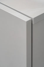 Gray media wall unit corner panel with smooth top edge