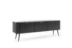 Mila TV cabinet in dark finish with fluted front doors, drawer panel, and tapered legs.